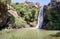 Mountain  Saar Falls with cold and crystal clear water descends from a crevice in the mountains of the Golan Heights in Israel