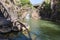 Mountain  Saar Falls with cold and crystal clear water descends from a crevice in the mountains of the Golan Heights in Israel