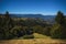 Mountain scenery shot with green vegetation and clear blue skies