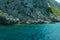 Mountain and sea. coastline with the overgrown rock