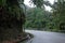 Mountain serpentine asphalt road in the Asian mountain jungle