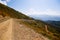 Mountain serpentine. Dirt road in the mountains. Country road in the mountains