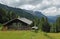 Mountain shelters in the austrian alps, against dramatic clouds