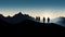Mountain Silhouette with Hikers