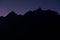 Mountain silhouette violet sky before sunrise