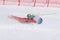 Mountain skier falling down on mountain slope. Russian Alpine Skiing Cup, slalom