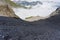 Mountain slope with much gravel and grit on a hiking trail in the alps