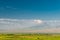 Mountain Small Ararat behind a cloud and green field, beautiful landscape