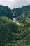 Mountain snow becomes river with waterfalls