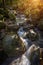 Mountain stream in the rocks in autumn in Monchique.