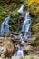 Mountain stream and rocky waterfall. Tourist and geological landmark. Waterfall Trufanets. Carpathians,