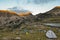 Mountain at sunrise with camping panoramic view