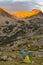 Mountain at sunrise with camping panoramic view