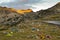 Mountain at sunrise with camping panoramic view