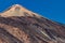 Mountain Teide and lava fields around volcano. Bright blue sky. Teide National Park, Tenerife, Canary Islands, Spain