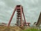 Mountain tool. construction of a mine for mining. mining work. large red metal mining crane