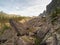 Mountain track through Western Sayans kurumnik, stones, cobblestones, moss with a unique landscape. Landscape photography of stone