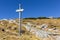 Mountain trail directional signpost in Sierra de Gredos mountains, Spain.