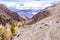 Mountain trail in the rocks. Mountain road with stones.