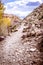 Mountain trail in the rocks. Mountain road with stones.