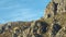 Mountain trail on rocky slope under blue sky. Shot. Wonderful view on European rocks