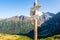 Mountain trail wooden directional sign in Tatra Mountains, pointing direction to Morskie Oko lake, Poland