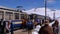Mountain Train with Tourists at the Top Train Station near Snowy Mountain Rochers-de-Naye, Montreux, Switzerland