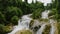 Mountain with Tropical Waterfalls. Aliwagwag Falls in the Philippines.