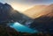 Mountain valley and lake with turquoise water at sunrise in Nepa