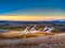 Mountain valley with several smoking geysers