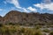 Mountain and valley view along Wadi Sahtan road and snake canyon in Al Hajir mountains between Nizwa and Mascat in Oman
