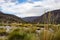 Mountain and valley view along Wadi Sahtan road and snake canyon in Al Hajir mountains between Nizwa and Mascat in Oman