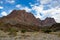 Mountain and valley view along Wadi Sahtan road and snake canyon in Al Hajir mountains between Nizwa and Mascat in Oman