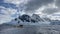 Mountain view in Antartica with reflection in water