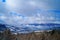 Mountain view covered with snow under a blue sky with white clouds