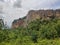 Mountain view greenary nature hill trees terrains cloud sky sunny