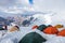 Mountain view from Lenin peak camp 4. Climbers preparing for summit attempt in their tents