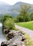 Mountain view. Path in the park. Cloudy day