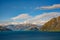 Mountain views and Lake Hawea. In summer there are green grass and blue skies with beautiful clouds