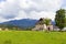 Mountain villa and the Bucegi mountains on background