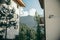 Mountain village in Russia. Krasnaya Polyana. Summer view of the mountains between the houses