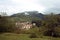 Mountain village. Village houses mountains in the background