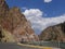 Mountain walls with the road leading to the Shoshone Canyon tunnel and Buffalo Bill dam visitors center in Wyoming