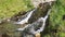 Mountain water stream flowing through rocks