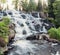 Mountain waterfall in the dense forest, Sweden