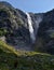 Mountain waterfall with a fast stream