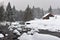 Mountain wooden chalet covered with fresh snow