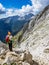 The mountaineer enjoying the view from the mountain