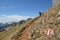 Mountaineer on a hiking trail in the austrian alps