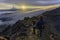 mountaineer in the north ilinzia volcano at sunrise
